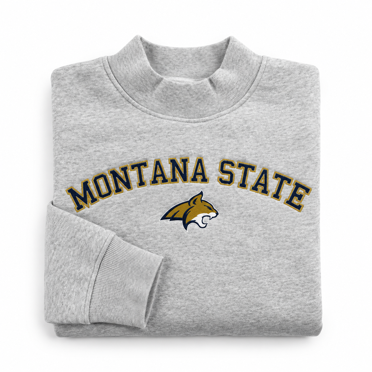 No Rivals Montana State Mock Neck - Grey: an oversized grey mock neck sweatshirt featuring the text MONTANA STATE in navy with gold trim above a bobcat mascot logo.