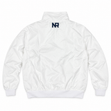 Back view of a white Penn State Hockey Windbreaker by No Rivals, featuring a navy blue NR logo at the center of the collar.