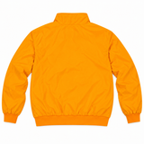 The Tennessee Reversible Windbreaker by No Rivals is bright orange polyester with a high collar, long sleeves, elastic cuffs and waistband—lightweight for sporty or casual looks, shown in a back view.