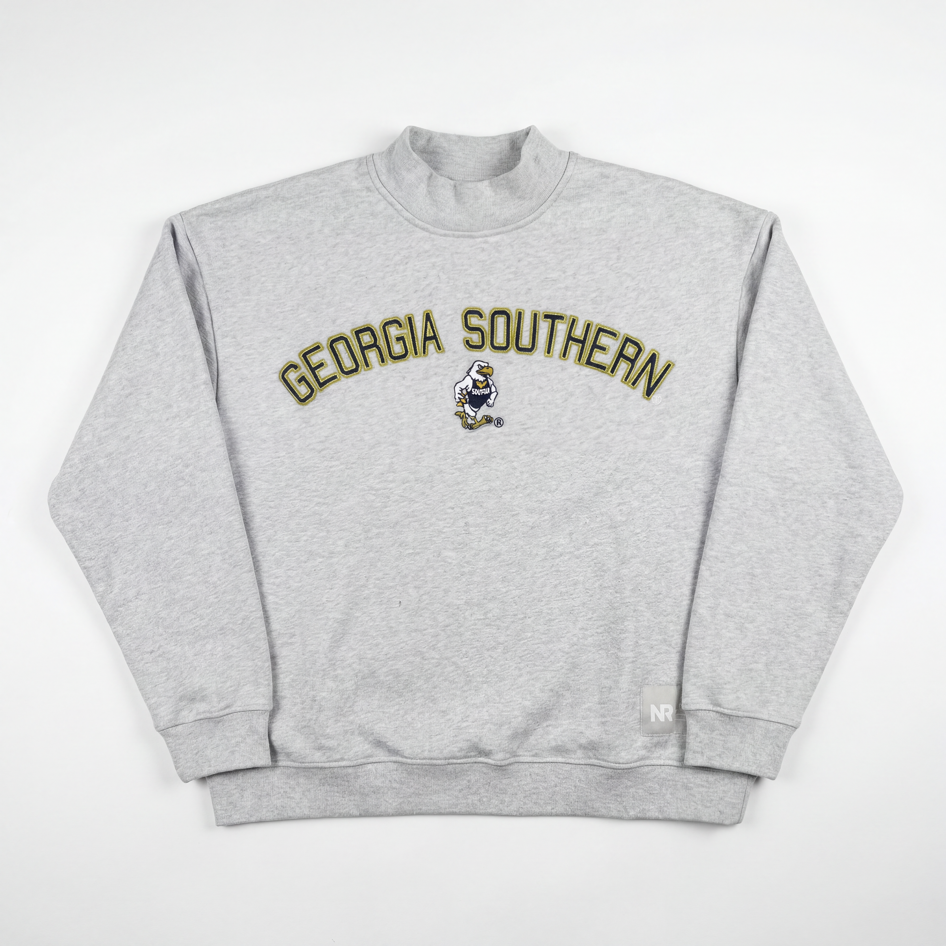 The No Rivals Georgia Southern Mock Neck is a light gray, oversized sweatshirt with bold yellow "GEORGIA SOUTHERN" lettering and a small mascot graphic across the chest, shown laid flat on a white background.