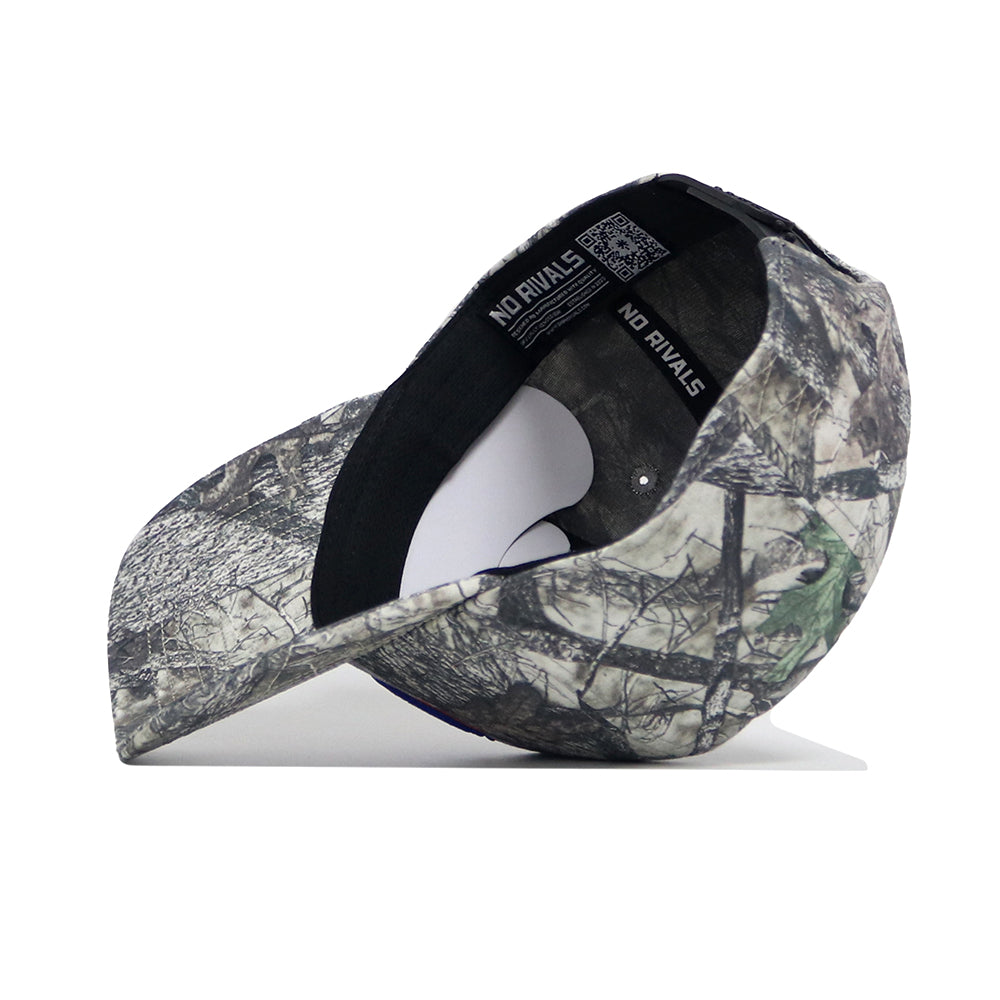 The No Rivals Boise State Outland Hat, a high-quality cotton camouflage baseball cap, is shown upside down on a white background, revealing its structured fit, inner black sweatband, and QR code label.