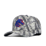 The No Rivals Boise State Outland Hat is a camouflage cotton baseball cap with a blue and orange horse head logo, curved brim, structured fit, and adjustable back strap.
