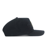 Side view of a black Baylor Bears Night Mode Hat with BAYLOR embroidered in black, gold, and green on the front.