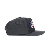 Side view of the No Rivals Georgia Bulldogs Military Appreciation Hat in black, featuring perforated side panels, a flat brim, an embroidered cartoon bear face with red, white & blue accents, and a Snap Back Adjustment for the perfect gameday fit.