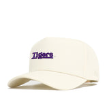 The LSU Sideline Hat by No Rivals is a cream-colored baseball cap featuring “Tigers” embroidered in bold purple on the front. Made of high-quality cotton, it offers a structured fit and curved brim for lasting comfort and style.