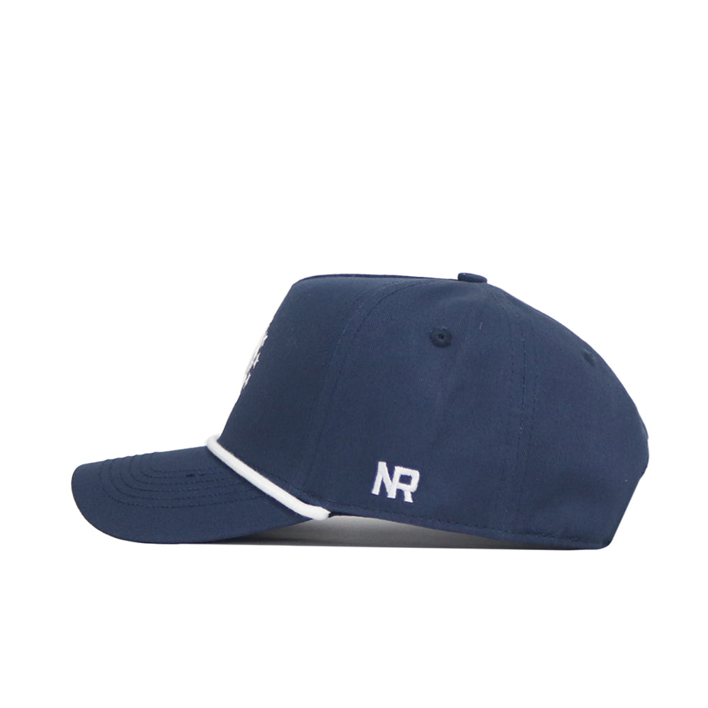 The No Rivals USA 1776 Americana Hat is a navy snapback with a structured fit, white brim trim, and "NR" initials embroidered in white on the side, displayed in profile against a white background.