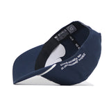 The No Rivals USA 1776 Americana Hat is a navy blue structured-fit baseball cap shown upside down, revealing its black sweatband, white lining, interior printed text, curved brim, and white text along the side.