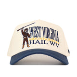 The No Rivals WVU Mountaineers Stacked Mascot Hat is a beige and blue cap made from performance fabric, featuring a front design of a mountaineer holding a rifle with the text “West Virginia Mountaineers Hail WV.” This classic snapback style provides adjustable comfort for every fan.
