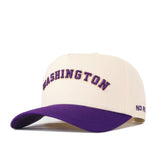 The Right Side Up Washington Hat - UW - Classic by No Rivals is a cream-colored baseball cap with an embroidered WASHINGTON logo in purple on the front and a matching purple curved brim. The side features “NO RULES” embroidered in purple, and its snapback design provides an adjustable fit.