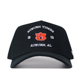 The Auburn Outlaw Hat - Black by No Rivals is a black snapback baseball cap featuring “Auburn Tigers,” “1866,” and “Auburn, AL” embroidered in white, with an officially licensed orange Auburn University logo embroidered at the center.