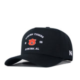 Introducing the Auburn Outlaw Hat - Black by No Rivals: This officially licensed baseball cap features the Auburn Tigers logo and “Auburn Tigers 1856 Auburn, AL” embroidered in white, an embroidered N logo on the side, and an adjustable snap back closure.