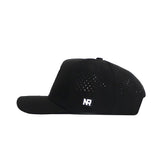 The BYU Golf Hat - Black by No Rivals features a structured fit, small ventilation holes, and a white NR logo patch on the side, displayed in profile against a plain white background.