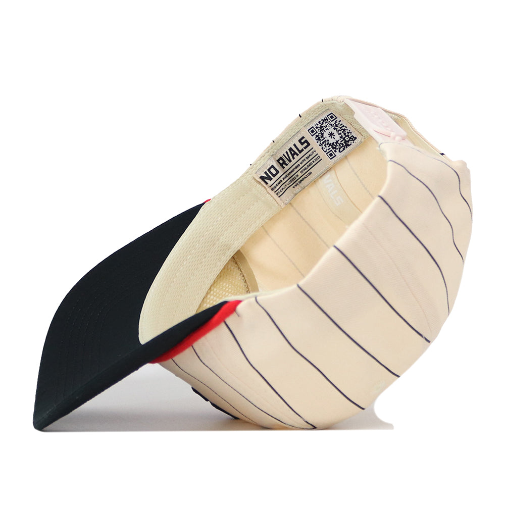 The Texas Tech Pinstripe Hat by No Rivals is shown sideways to reveal its interior, including a QR code tag and an inside label with the brand name. This cream-colored baseball cap features black pinstripes, a black brim, and a Snap Back Adjustment for an unstructured fit designed to be one size fits most.