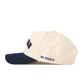 Introducing the Right Side Up Auburn Hat - Classic Colors by No Rivals: a cream-colored baseball cap with a navy blue brim, showcasing an embroidered logo on the front and NO RIVALS stitched on the side in navy blue. Its classic snapback design makes it the ideal addition to your gameday outfit.