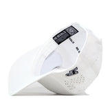 The Purdue Boilermakers Football Mascot Hat in white by No Rivals is displayed upside down, revealing an interior NO RIVALS label and a QR code. This performance fabric cap features perforations for enhanced breathability, a snap back closure for customizable fit, and an embroidered logo on the side.