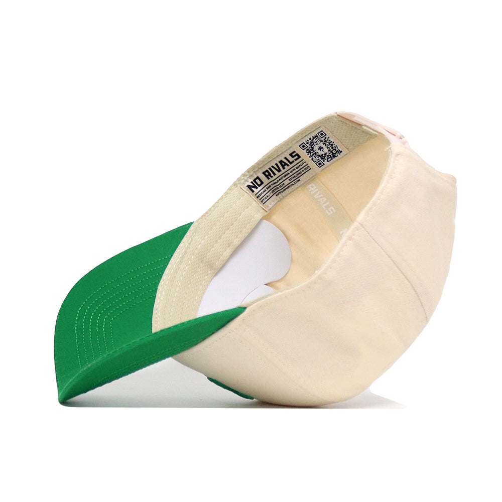 The North Dakota Logo Patch Hat by No Rivals is a cream and green snapback shown inside out, highlighting its structured fit, sweatband, and an interior label that reads NO RIVALS with a QR code.
