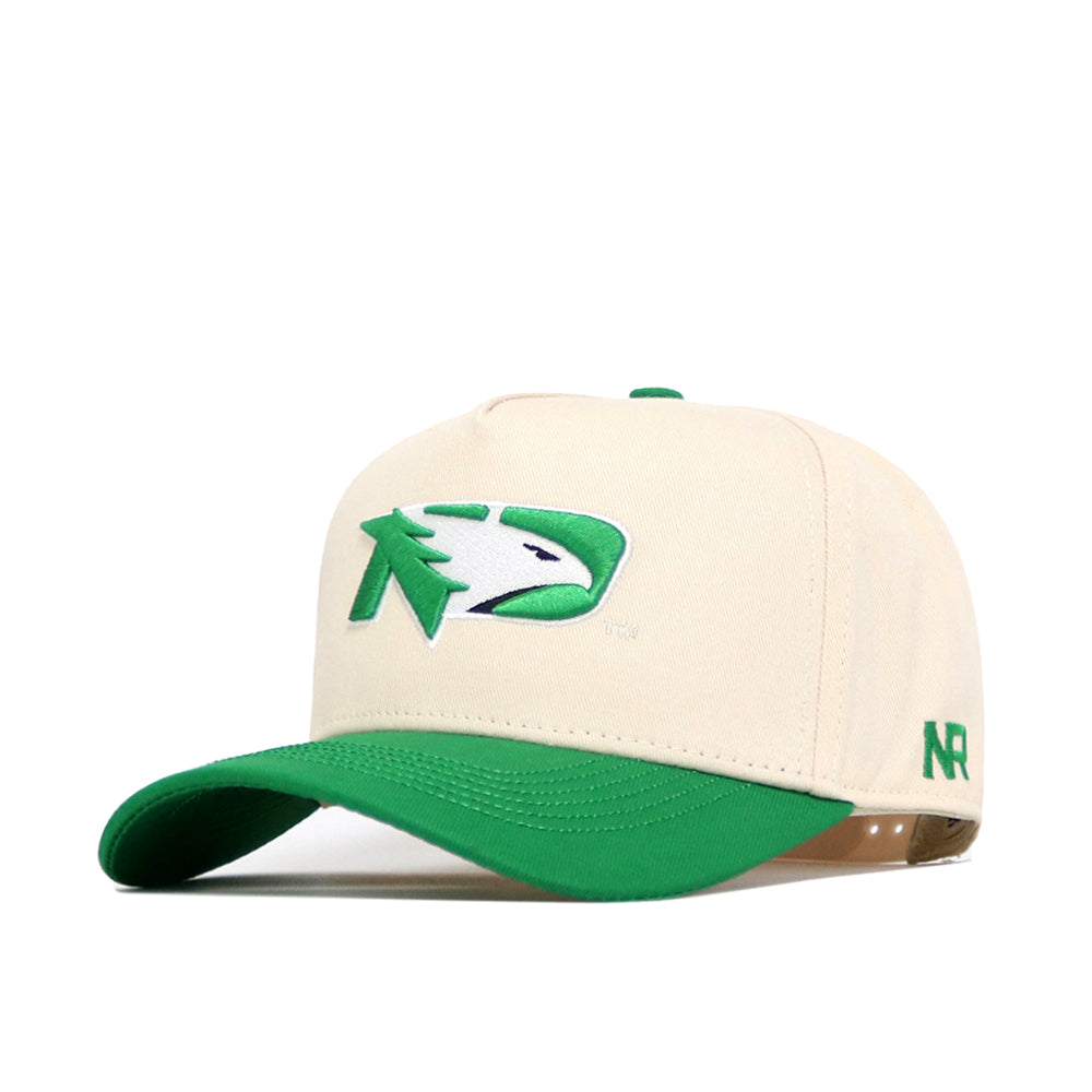 The No Rivals North Dakota Logo Patch Hat features a structured beige design with a green bill, an embroidered green and white bird logo on the front, and "NR" stitched in green on the side.