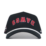 Introducing the Georgia Bulldogs | Upside Down Dawgs Hat - Blackout by No Rivals: This striking black snapback features “DAWGS” boldly embroidered in upside-down red lettering on the front, accented with a sharp white trim above the brim and a logo patch on the left side—a must-have statement piece for any Georgia Bulldogs fan looking to stand out.