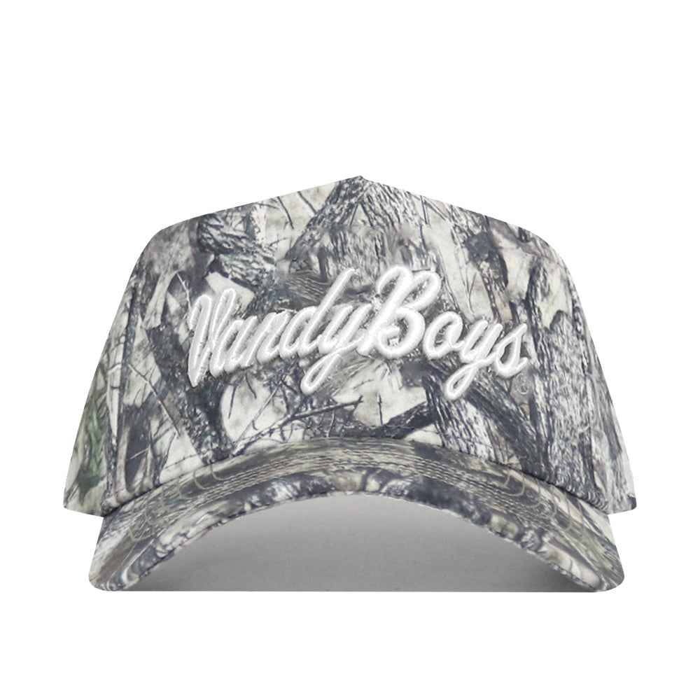 The Vandy Boys Outland Hat by No Rivals is a camouflage snapback featuring "MundyBoys" in white cursive embroidery on the front, made from premium cotton for comfort and style.