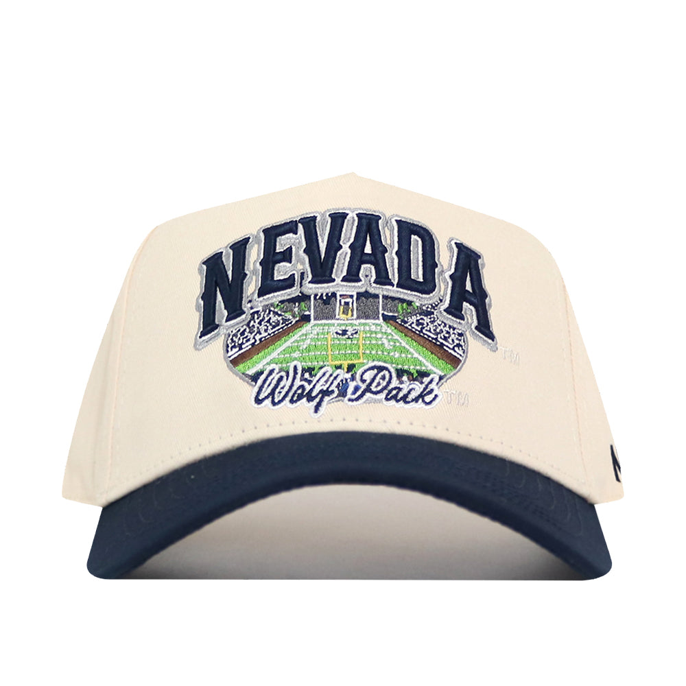 A beige and navy blue No Rivals Nevada Wolf Pack Stadium Hat featuring officially licensed embroidered NEVADA and Wolf Pack logos above an image of a football stadium on the front.