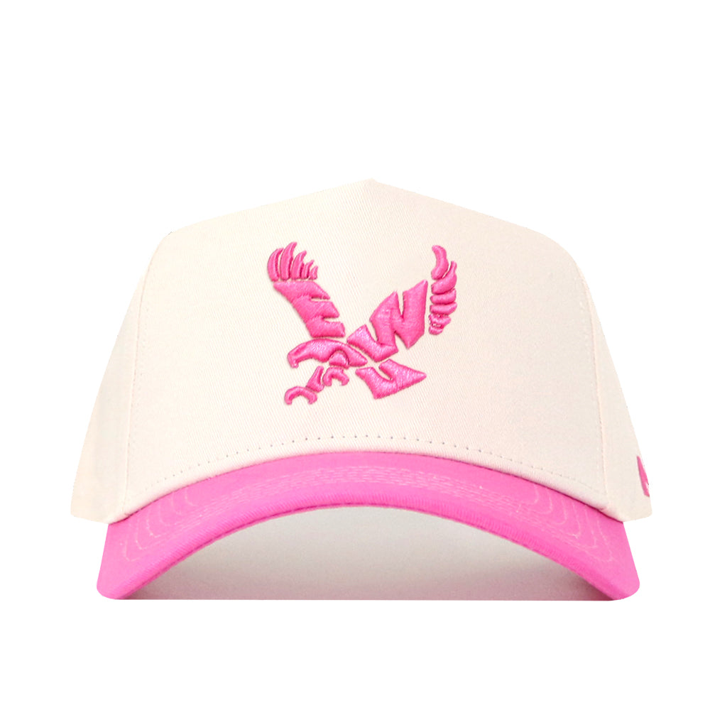 Introducing the EWU Pink Out Hat by No Rivals: a white performance fabric baseball cap, featuring a vibrant pink brim and a pink embroidered eagle logo on the front, complete with an adjustable snap back closure for a perfect fit.