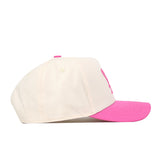 The No Rivals EWU Pink Out Hat is a beige baseball cap with a vivid pink brim and a coordinating pink button on top, featuring a Snap Back Adjustment for a customizable fit, displayed from the side against a white background.