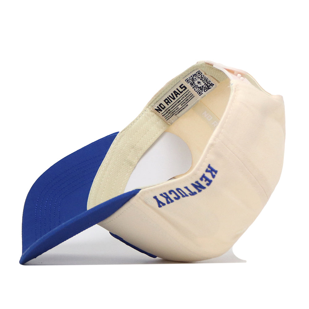 A cream and blue Kentucky Vintage K Hat - Classic by No Rivals is shown upside down, revealing “KENTUCKY” and a QR code on the inside—perfect for finishing off your gameday look.