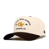 The No Rivals Georgia Tech Yellow Jackets Outlaw Hat - Classic features a beige and black snapback design with “Georgia Tech Jackets 1885 Atlanta, GA” and a gold GT embroidered logo on the front—officially licensed for true fans.
