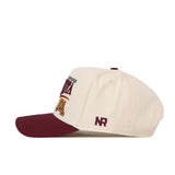The No Rivals Minnesota Golden Gopher Stride Hat is a cream-colored snapback featuring a maroon brim, maroon lettering, and embroidered logos on the side. “NR” is embroidered in maroon near the back of the cap.