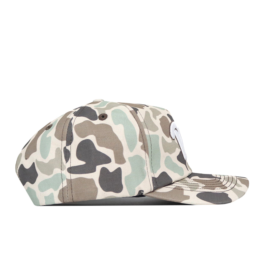Side view of the Pittsburgh Panthers Huntsman Hat by No Rivals, featuring a camouflage pattern in beige, green, and brown tones. Crafted from high-quality cotton, this hat offers a structured fit with a curved brim and visible stitching.