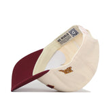 The No Rivals Minnesota Golden Gophers | Upside Down Minnesota Hat - Classic, featuring a cream and maroon design with an embroidered M logo on the side, is displayed upside down to reveal the inside label and a QR code beneath the brim.