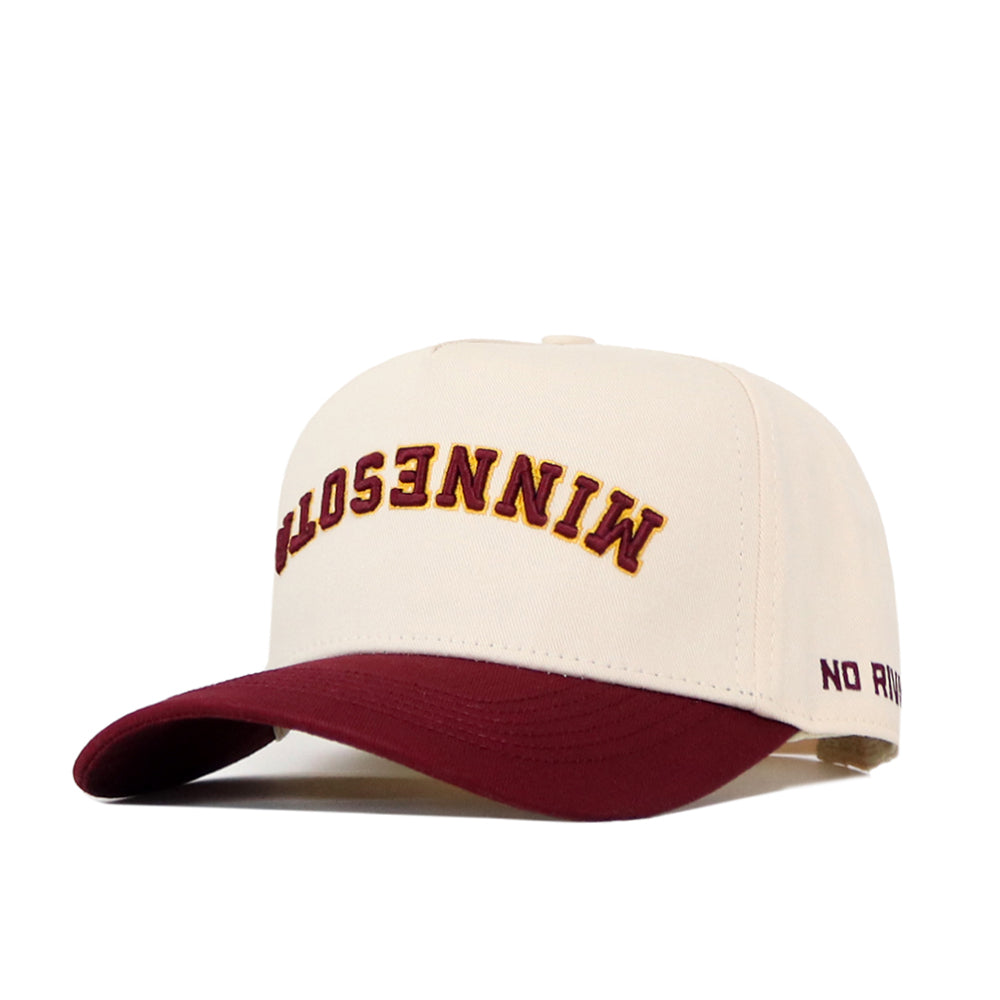 The No Rivals Minnesota Golden Gophers | Upside Down Minnesota Hat - Classic is a cream snapback baseball cap featuring upside-down “MINNESOTA” embroidery in maroon and gold, inspired by the Minnesota Golden Gophers, with a maroon brim and “NO RULES” stitched on the side near the back.