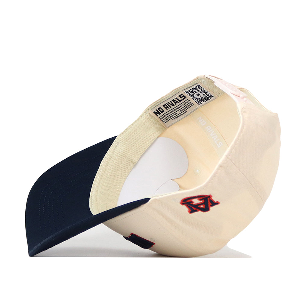 Beige and navy Auburn Tigers | Upside Down Auburn Hat - Classic Colors by No Rivals shown flipped upside down, displaying the inner lining, a NO RIVALS label, and a QR code. This stylish cap features the Auburn University logo embroidered on the side for added spirit.