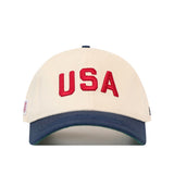 No Rivals USA Vintage Hat - 6 Panel Unstructured in cream with a navy blue brim and red USA embroidery across the front.