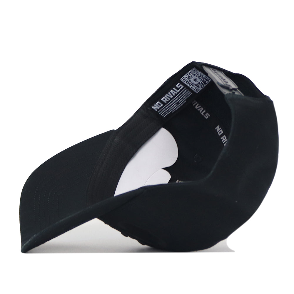 Side view of a blackout Rice Night Mode Hat by No Rivals, showing branded interior seam tape and a QR code inside the crown.