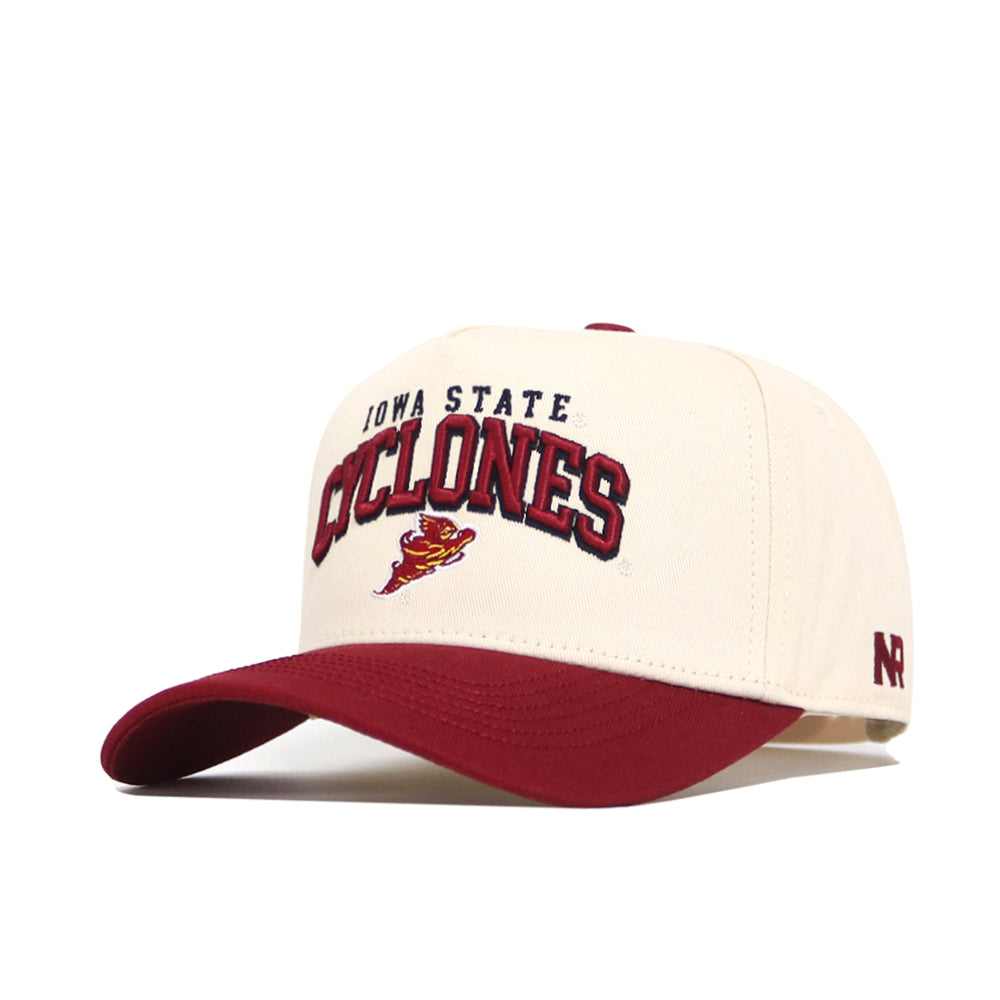 The Iowa State Arch Hat by No Rivals is a white and red snapback with the Cyclones logo and Iowa State embroidered on the front, a red brim, NR stitched on the side, and a structured fit for an officially licensed look.