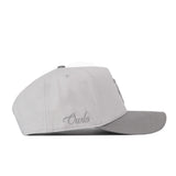 Rice Graphite Hat in light gray with a darker gray brim, featuring the word Owls embroidered in script on the side and a snapback closure.