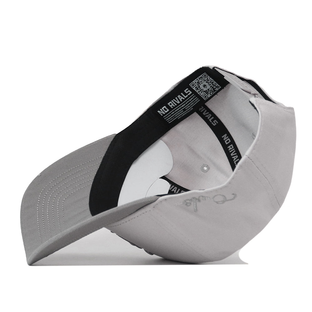 Side view of a premium structured light gray Rice Graphite Hat by No Rivals, highlighting the interior headband with branded text and a QR code.