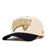 Cream-colored No Rivals Vanderbilt Stride Hat with a black brim, featuring embroidered VANDERBILT lettering in gold above a gold V logo.