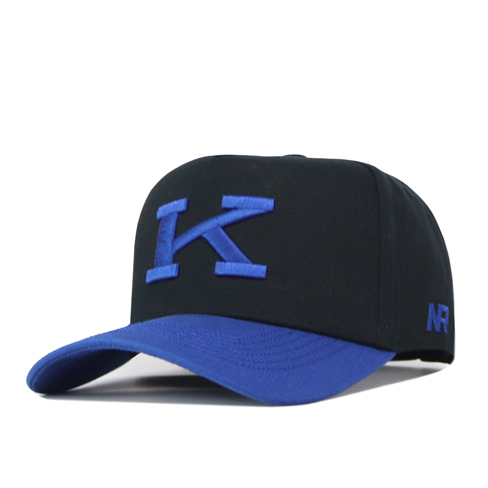 Introducing the Kentucky Vintage K Hat - Black by No Rivals: Featuring a bold blue embroidered ‘K’ logo on the front and subtle blue NR lettering on the side, this black baseball cap is finished with a striking blue brim and a classic snapback closure—making it an ideal choice for your next gameday ensemble.
