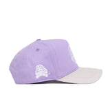 The No Rivals ECU Closer Hat - Powder Purple features a structured snap back fit, light gray brim, high-quality cotton, and a white embroidered pirate logo on the side.