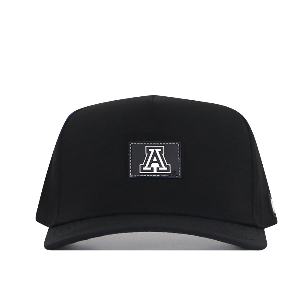 Introducing the Arizona Wildcats Trainer Hat by No Rivals—a structured black snapback crafted from high-quality cotton for everyday comfort and style. The front features a rectangular patch displaying a white letter “A” outlined in black, celebrating your Wildcats spirit in a classic design.