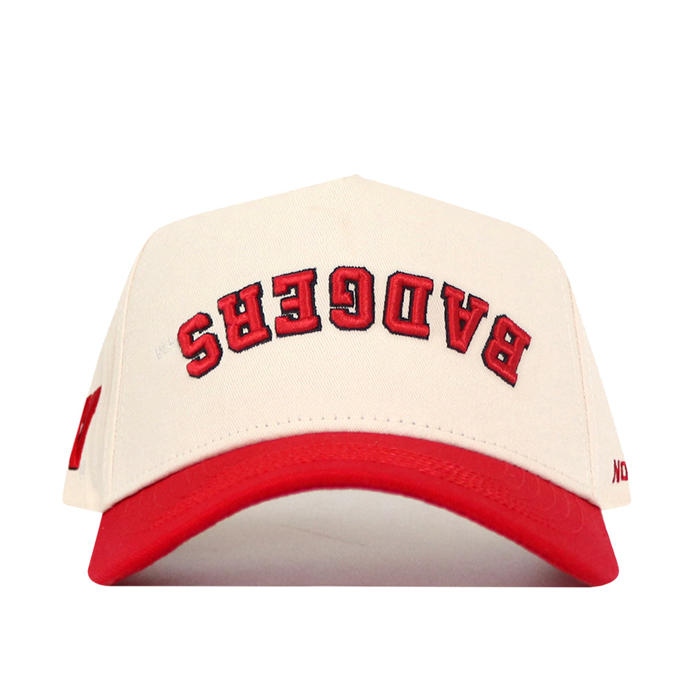 Show your Wisconsin pride with the No Rivals Wisconsin Badgers Upside Down Badgers Hat – Classic, a white and red snapback baseball cap featuring bold, arched red “BADGERS” lettering on the front—an essential piece for any true Badgers fan.