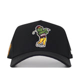 The No Rivals Arizona State Golf Hat in black features an embroidered cartoon character in yellow pants, a red ASU shirt, and maroon hat swinging a golf club. Officially licensed with a snap back for adjustable comfort.