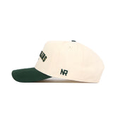 The No Rivals Fort Collins Hometown Hat is a cream-colored, structured baseball cap with a dark green brim, green embroidered text, NR side initials, high quality cotton, and an adjustable snap back closure.