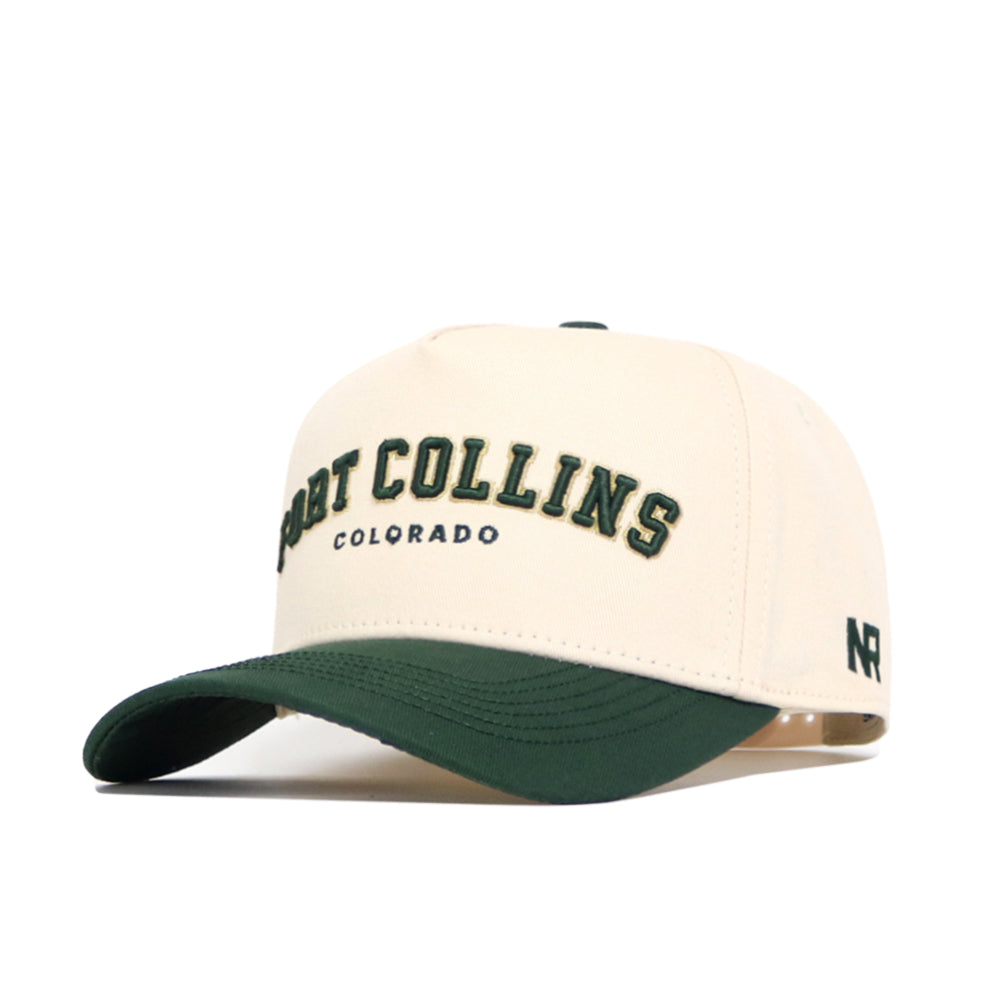 The Fort Collins Hometown Hat by No Rivals is a beige cotton cap with a dark green curved brim, featuring "FORT COLLINS COLORADO" in green and yellow embroidery and a small black N and R logo on the left side.