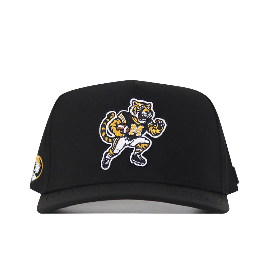 Introducing the Missouri Tigers Football Mascot Hat - Black by No Rivals, this cap showcases an embroidered tiger mascot in a football uniform holding a football, with the letter M displayed on its chest. Made from performance fabric and equipped with a snap back closure, it delivers bold team spirit and all-day comfort.