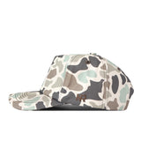A side view of the No Rivals WVU Mountaineers Huntsman Hat, featuring a camouflage pattern in shades of green, brown, and gray. Crafted from high-quality cotton with a structured snapback fit, this cap displays the embroidered NR initials on the side.