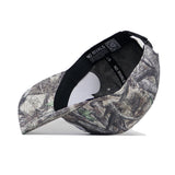The No Rivals BYU Outland Hat is a snapback cap with a forest camo exterior, structured fit, adjustable strap, and interior black band that displays "NO RIVALS" text.