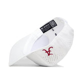 The Alabama Golf Hat - White by No Rivals is displayed on its side, showcasing an embroidered maroon V logo on the front, side ventilation holes, and a black inner label reading NO RIVALS.